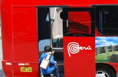 A Shoeshine Boy Going into Peru Bus