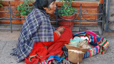 A Beggar Chewing Coca Leaves on the Corner of the Sol Avenue