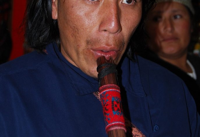 A Men Playing the Andean Quena
