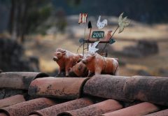 Bulls and Cross on a Cuzco Rooftop