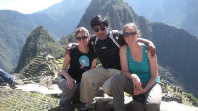 A Tourism Guide and Tourist in Machu Pichu